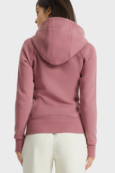 Veste de sport à capuche avec détails de coutures zippées